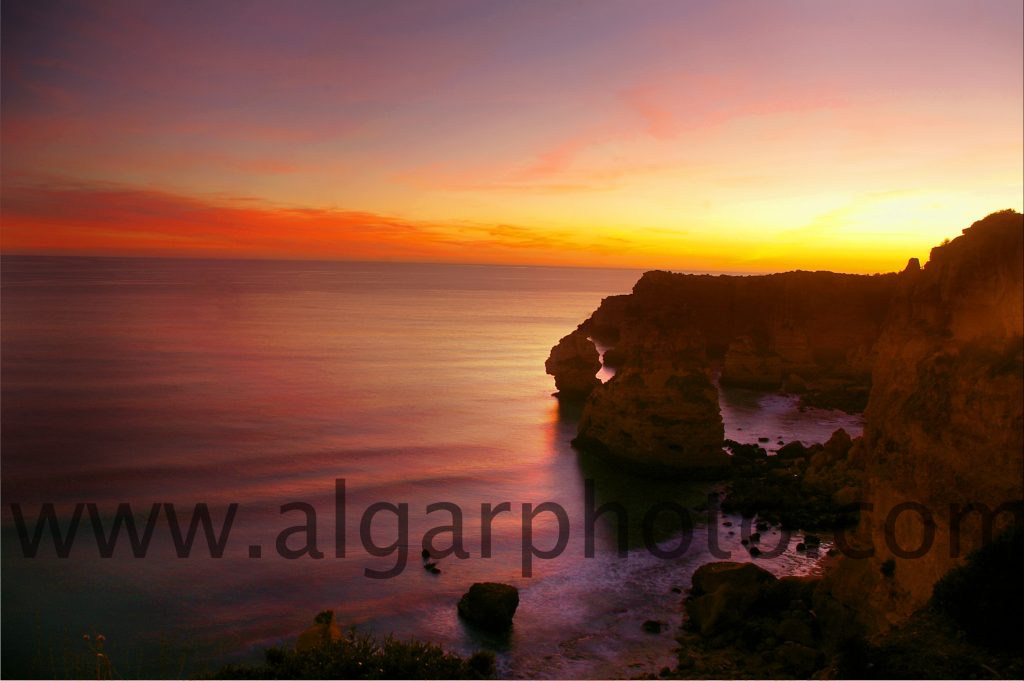 Sunset over Praia da Marinha in December